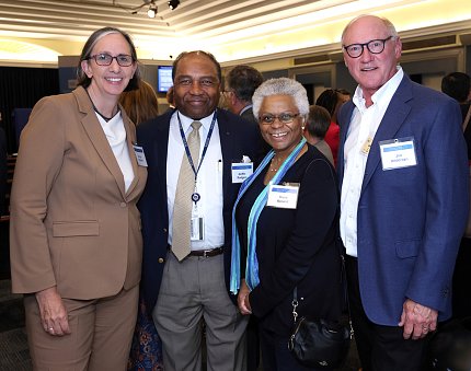 Rathmell, Rodgers, Bernard and Anderson stand together.