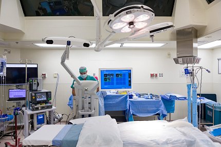 Operating room with doctor looking at screen