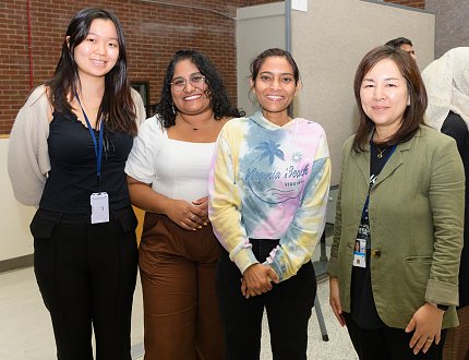 Park stands with colleagues in the CC.