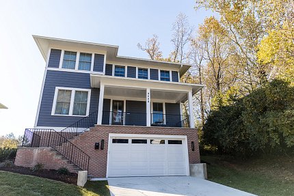 exterior of 2-story house with ground level garage