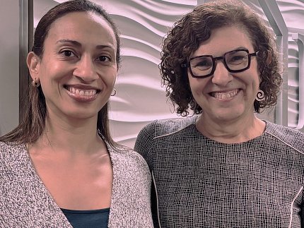 Forde (l) and Diez Roux (r) pose together for a photo.