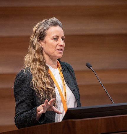 Kleinstreuer at podium with palm extended