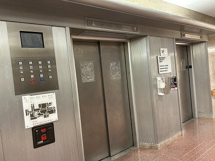 A pair of silver elevators.