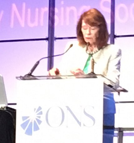 Grady speaks at podium