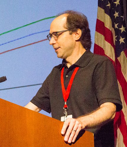 Richard Barnes speaks at podium.