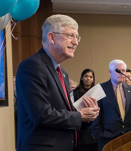 NIH director Dr. Francis Collins addresses the group while Rep. Pete Sessions looks on.