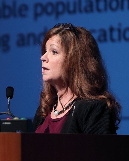 Dr. Kelly Ten Hagen speaks at town hall meeting.