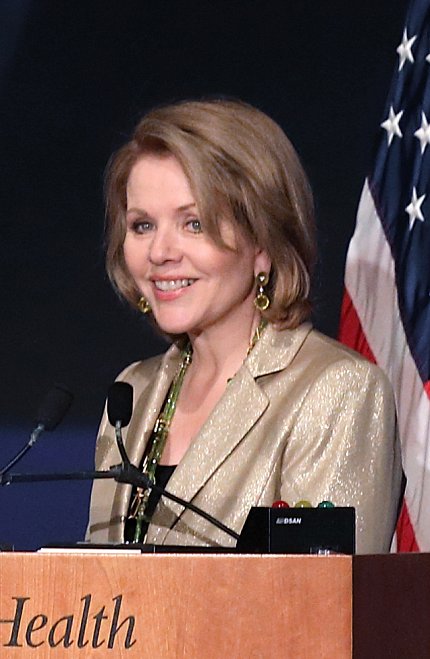 Fleming speaks at podium