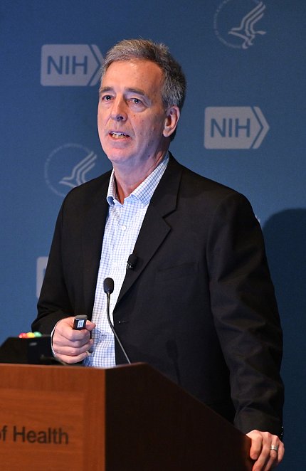 Dr. Wendler speaks at the podium.