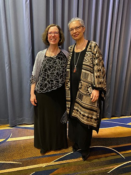 Rider and Goldbach-Mansky pose together.