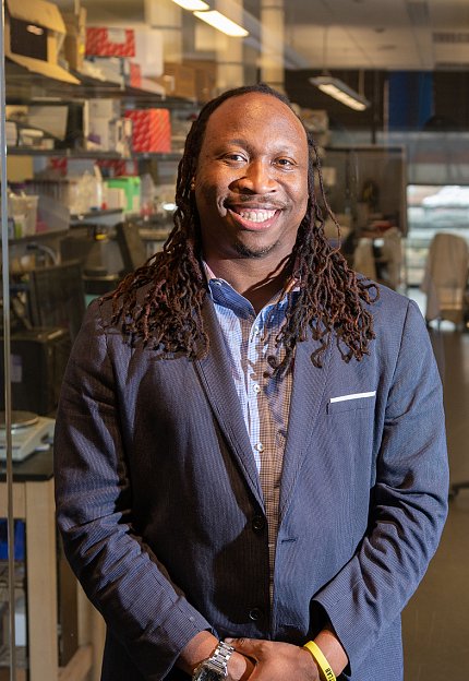 Platt smiling in the lab