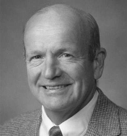 Dr. George R. Martin, black and white headshot