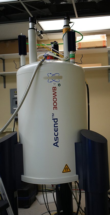 A large 'vat' with a powerful magnet inside in the NMR facility in NIH's Clinical Center