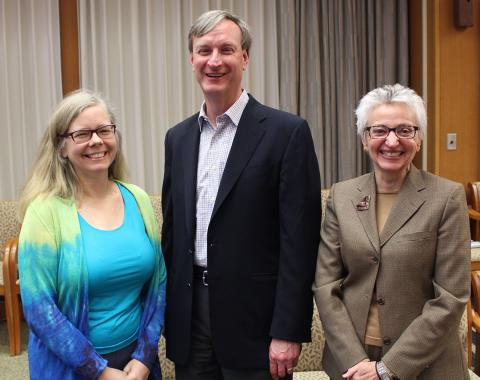 Bird, Page and Mazure stand, smiling 