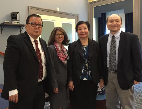 Four members of APAO panel pose for a photo.