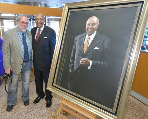 Frank Kutlak (l) with Stokes beside official Stokes portrait