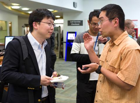 Zhang chats with guests.