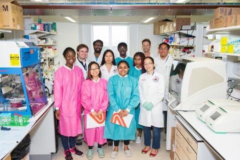 Students and staff in the lab