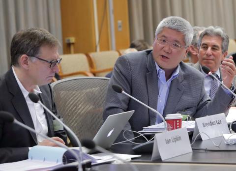 Dr. Lee speaks at meeting.