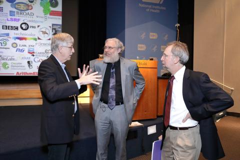 Drs. Church, Collins and Green confer before the lecture.