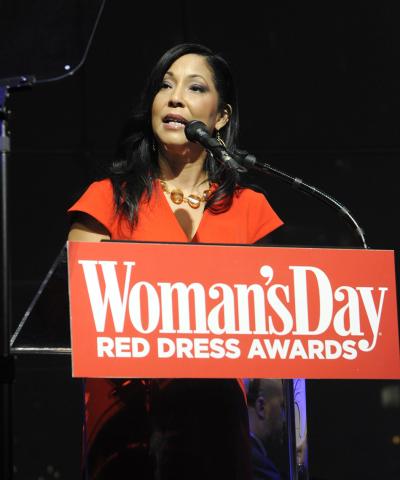 Dr. Clayton speaks at podium.