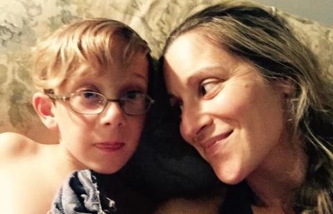 Carly Israel-Agin smiles at her son