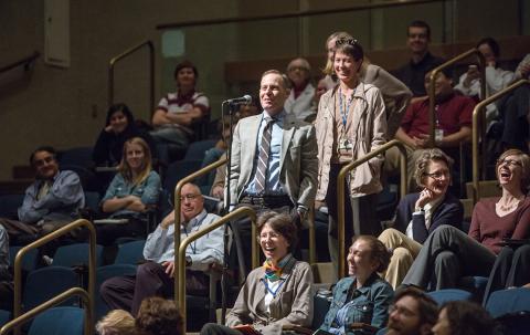 Members of the audience laugh during question and answer session.