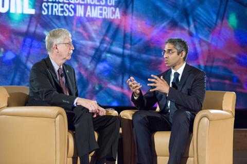 Drs. Murthy and Collins, seated onstage