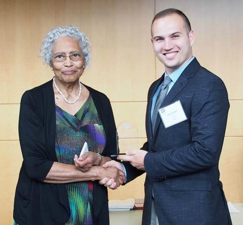 Hughes shakes hands with Cook