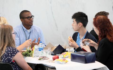 Dr. Rob Rivers speaks with young people interested in science.