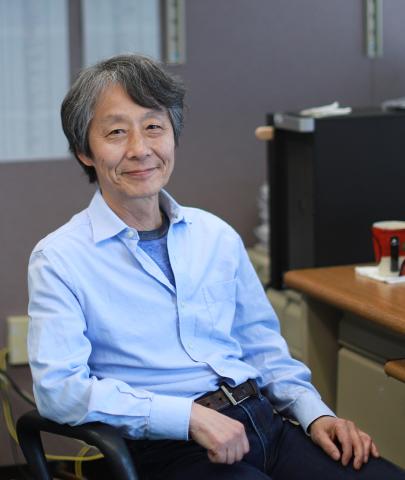 Hikosaka seated in office
