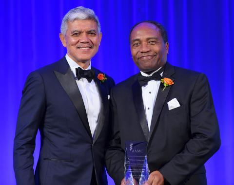 Rodgers with Wilson, both in black tie