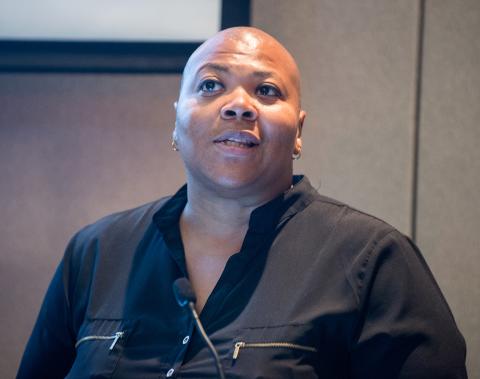 Dr. Rashada Alexander speaks at podium