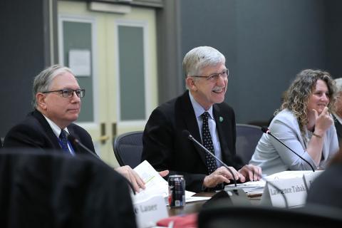 Dr. Collins leads meeting, flanked by Drs. Tabak and Wolinetz
