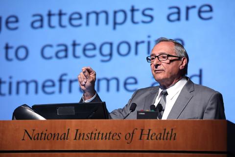 Dr. DiClemente speaks at podium.