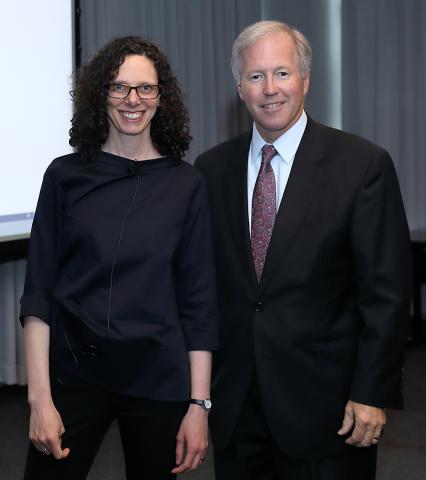 Roth and Andrews standing together, smiling