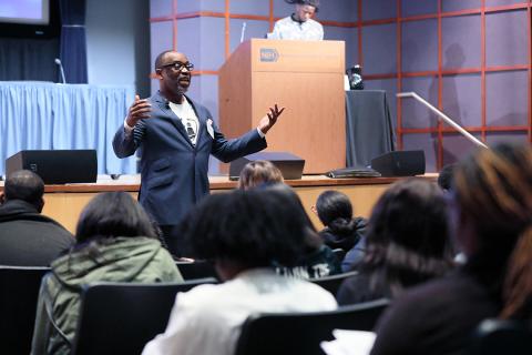 Mr. Morrison speaks to the group.