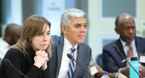 Katabi, Wilson and Hildreth seated at conference table