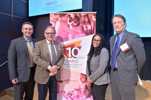 Group of presenters at symposium