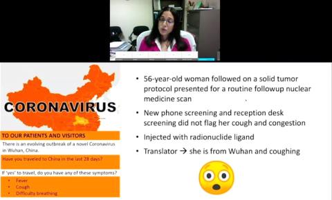 Dr. Palmore speaks via video camera