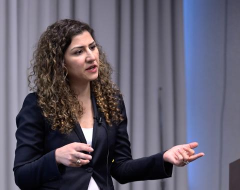 Shanechi points her finger as she describes her research model.