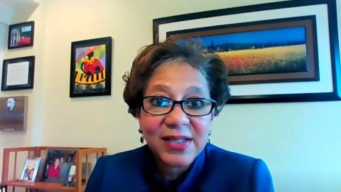 Cooper speaks from her home, surrounded by family photos and African art.