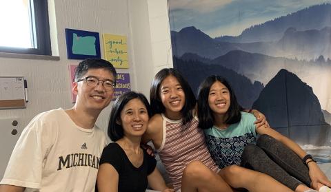 Chiang and his family smiling into camera