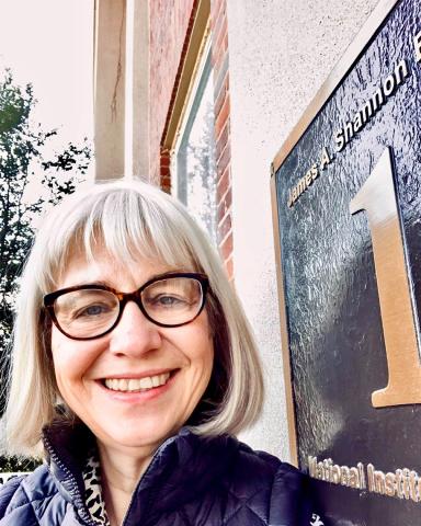 Kolberg smiles in front of Bldg. 1