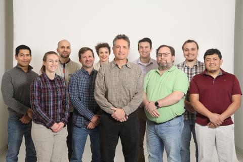 Pohida, center, with members of the IDEAS lab around him