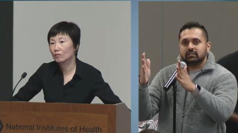 Split screen showing Dan at podium on left listening to a man holding up hands, asking a question