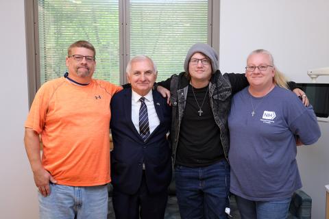 Reed with a patient and his parents