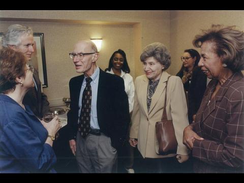 Rabson and Kirschstein walk through a crowd