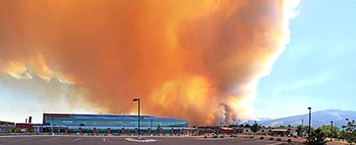 Smoke from a forest fire seen in back of RML building