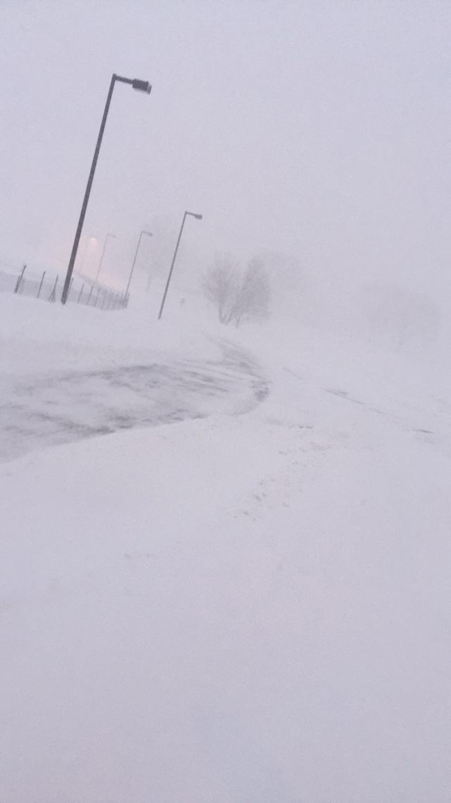 A snow-covered sidewalk